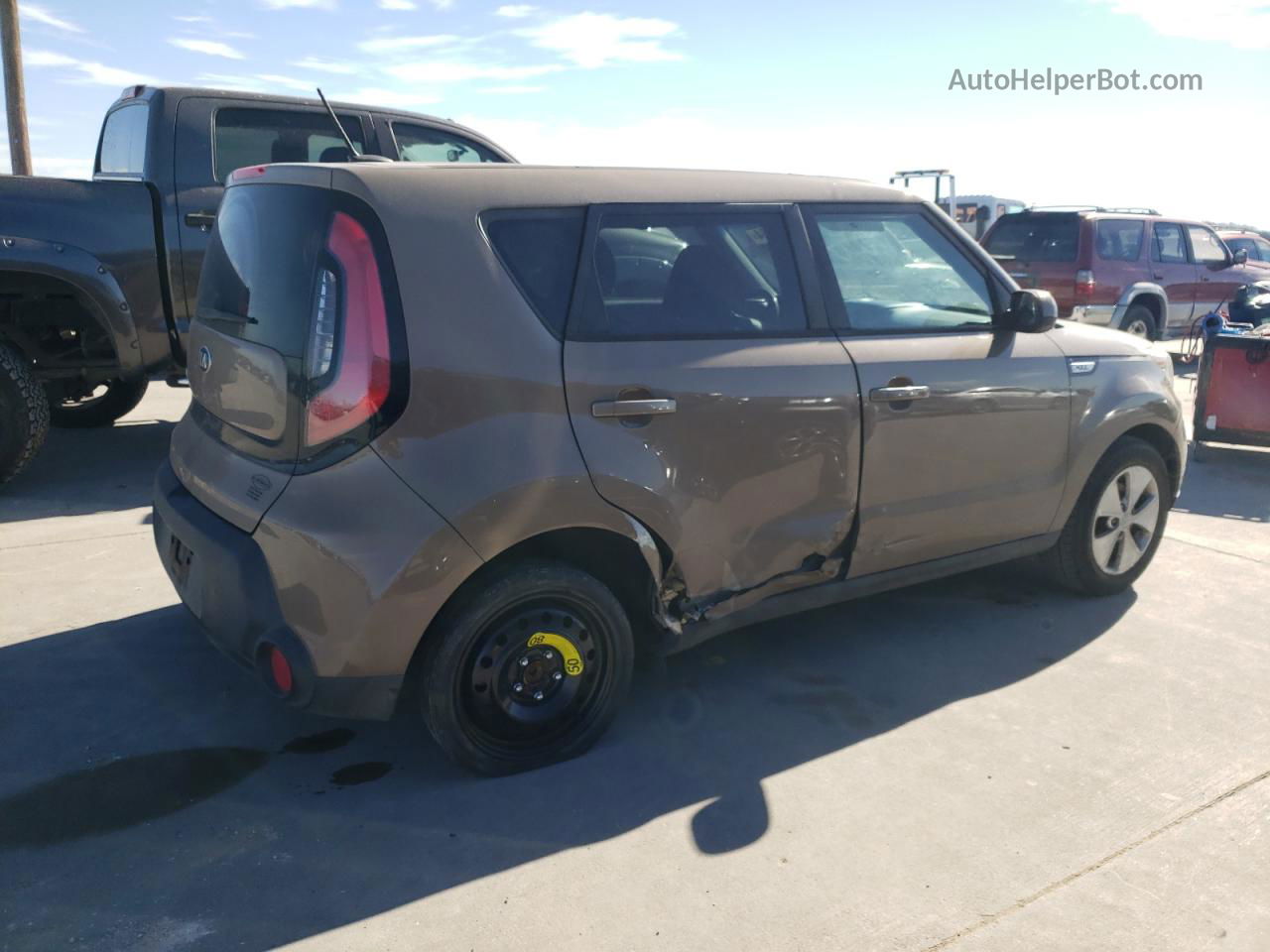 2016 Kia Soul  Желто-коричневый vin: KNDJN2A27G7244022