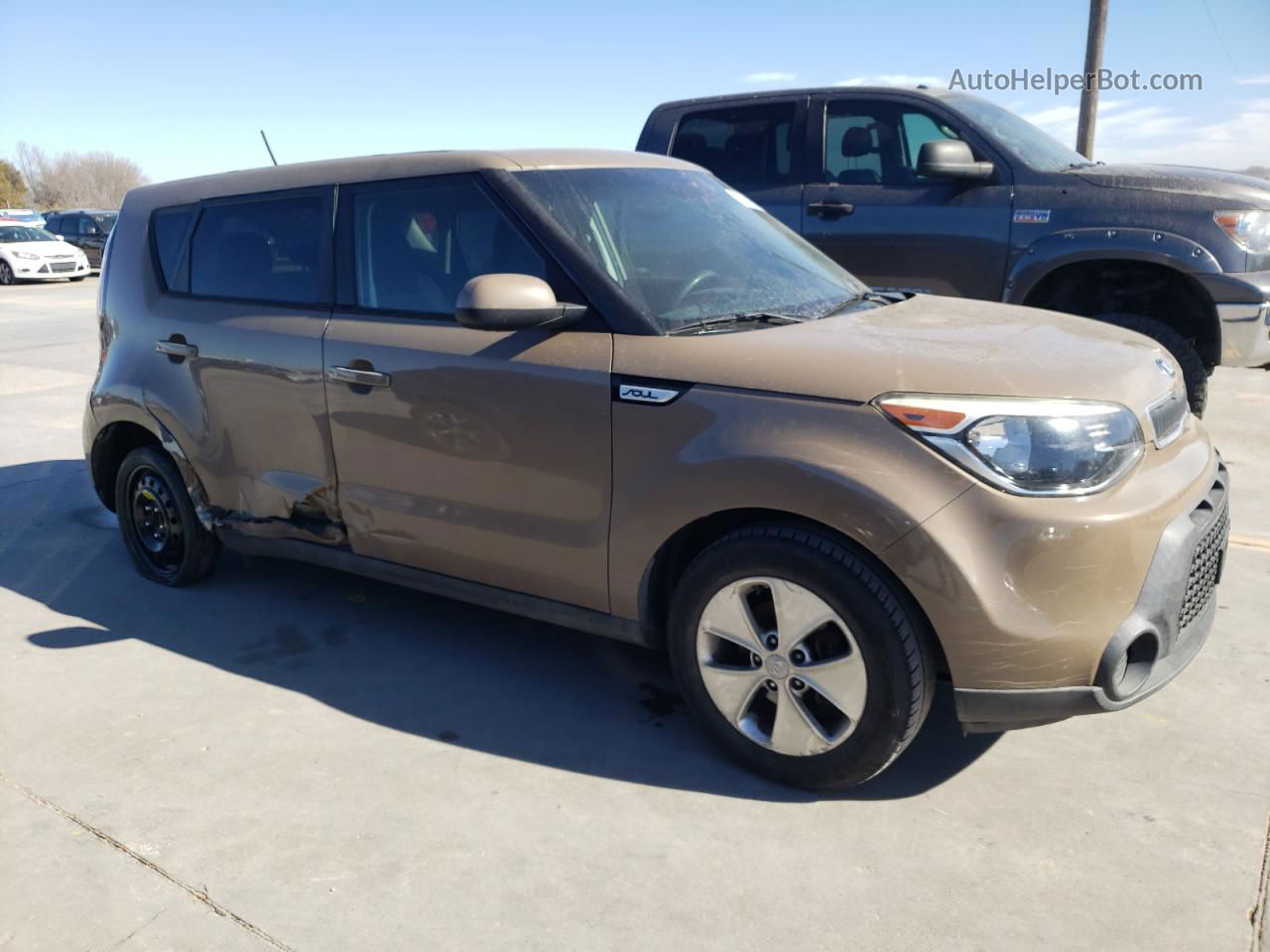 2016 Kia Soul  Желто-коричневый vin: KNDJN2A27G7244022