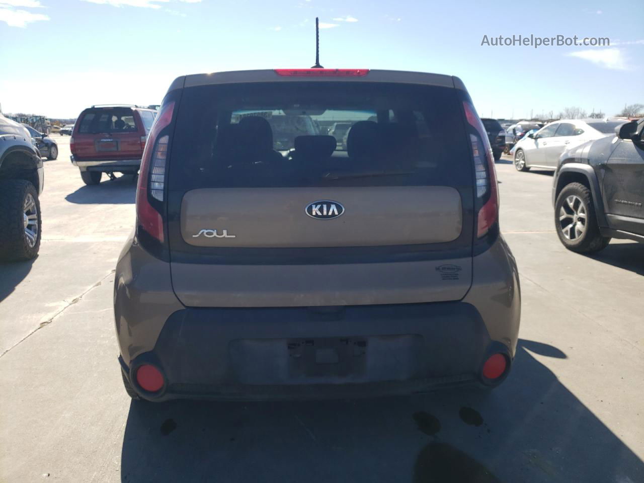 2016 Kia Soul  Желто-коричневый vin: KNDJN2A27G7244022