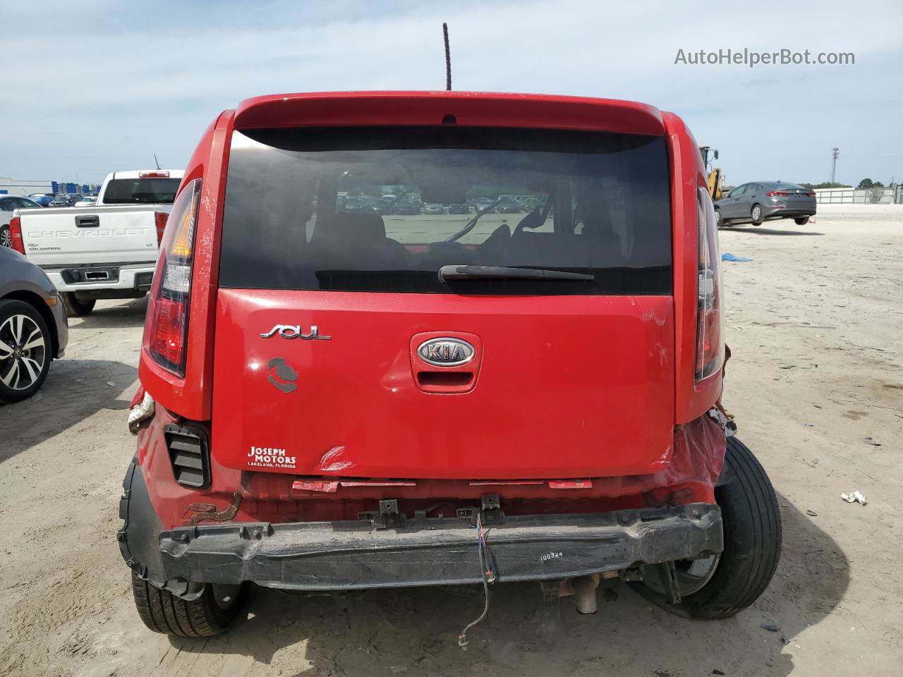 2010 Kia Soul + Red vin: KNDJT2A29A7166050