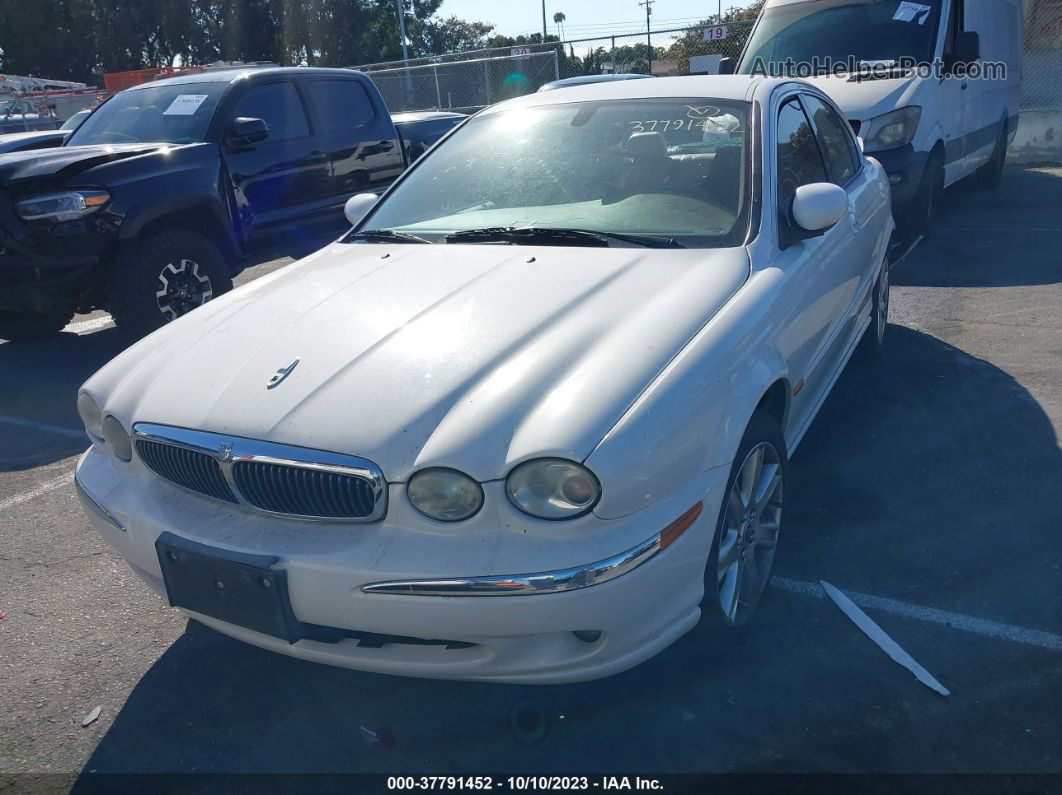 2003 Jaguar X-type 3.0l White vin: SAJEA51C53WD02009