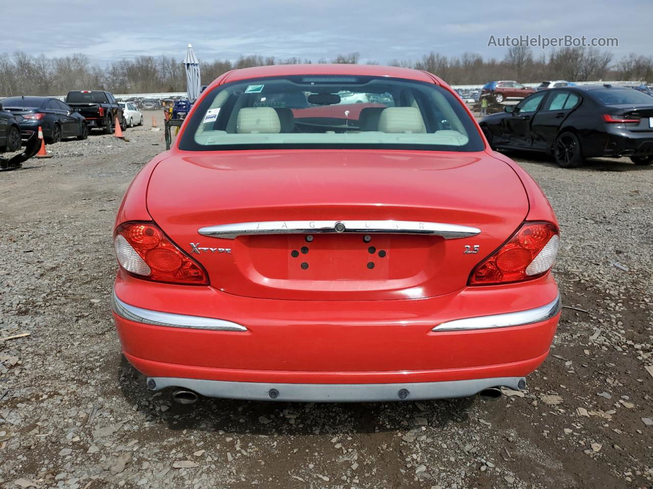 2003 Jaguar X-type 2.5 Red vin: SAJEA51D23XD33916