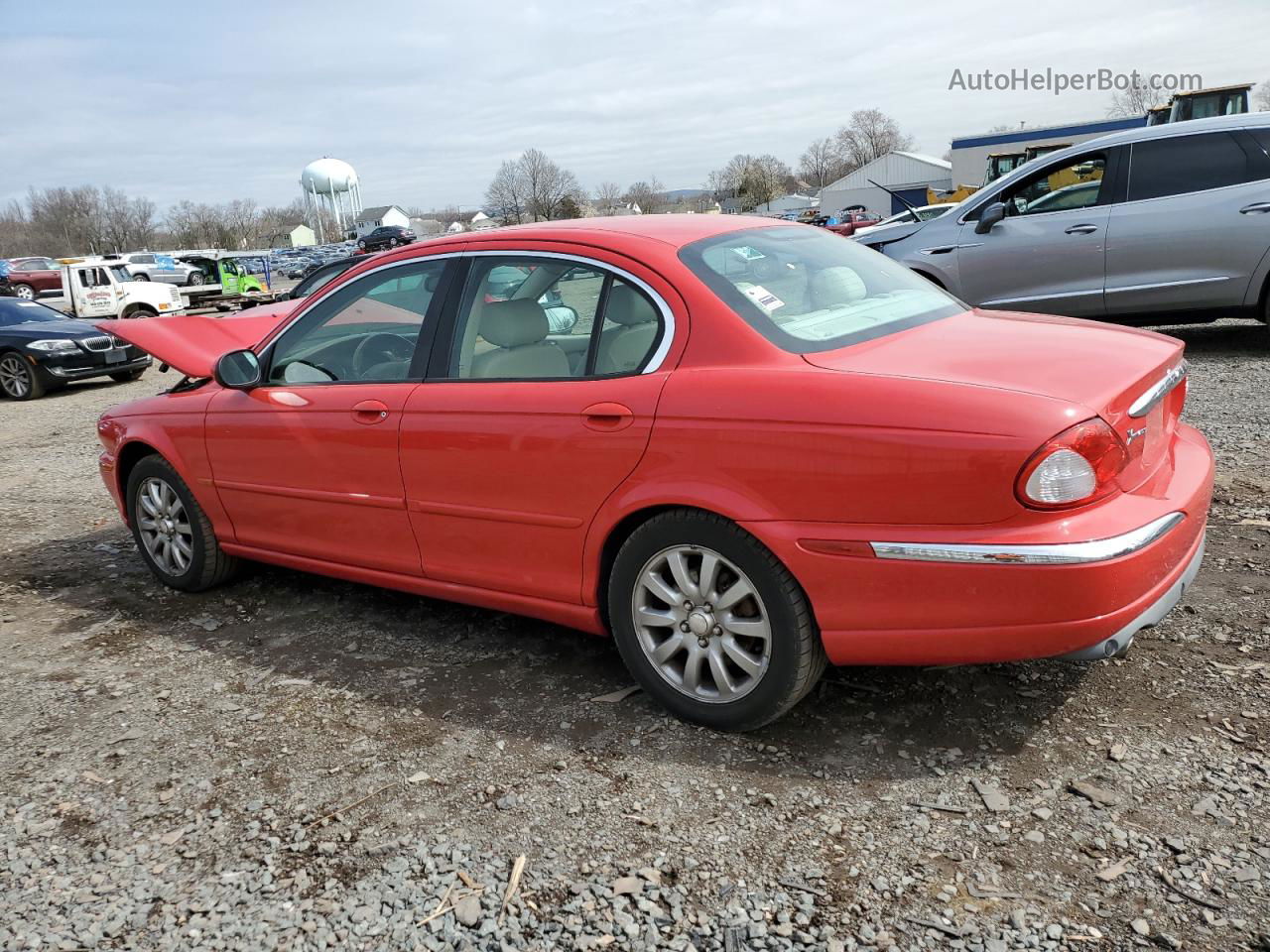 2003 Jaguar X-type 2.5 Red vin: SAJEA51D23XD33916