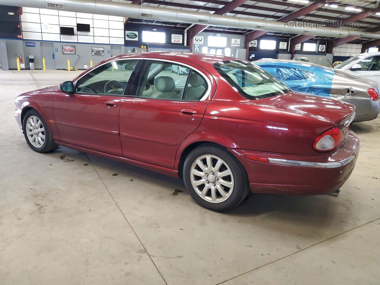 2003 Jaguar X-type 2.5 Burgundy vin: SAJEA51D63XD48807