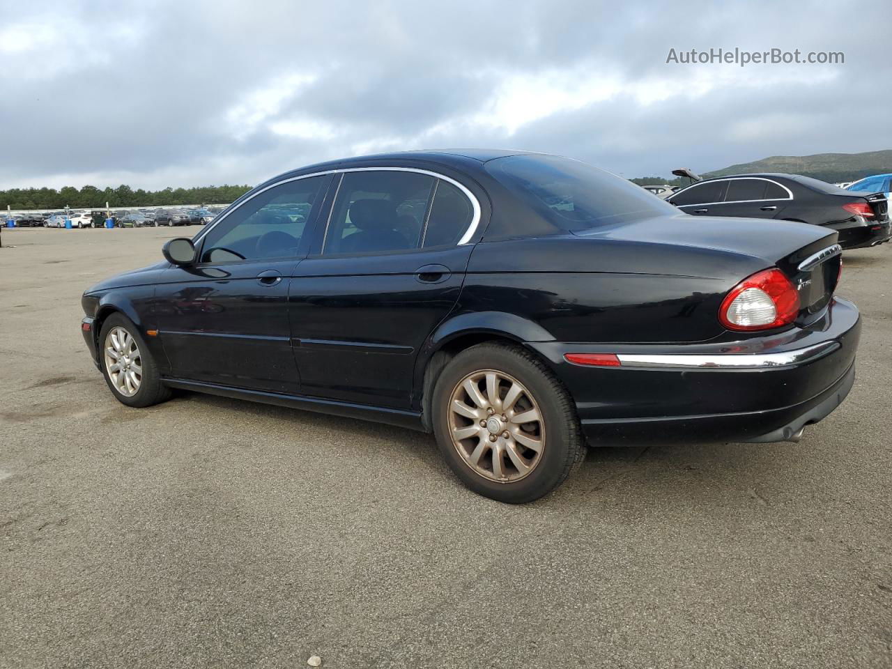 2003 Jaguar X-type 2.5 Черный vin: SAJEA51D73XD29456