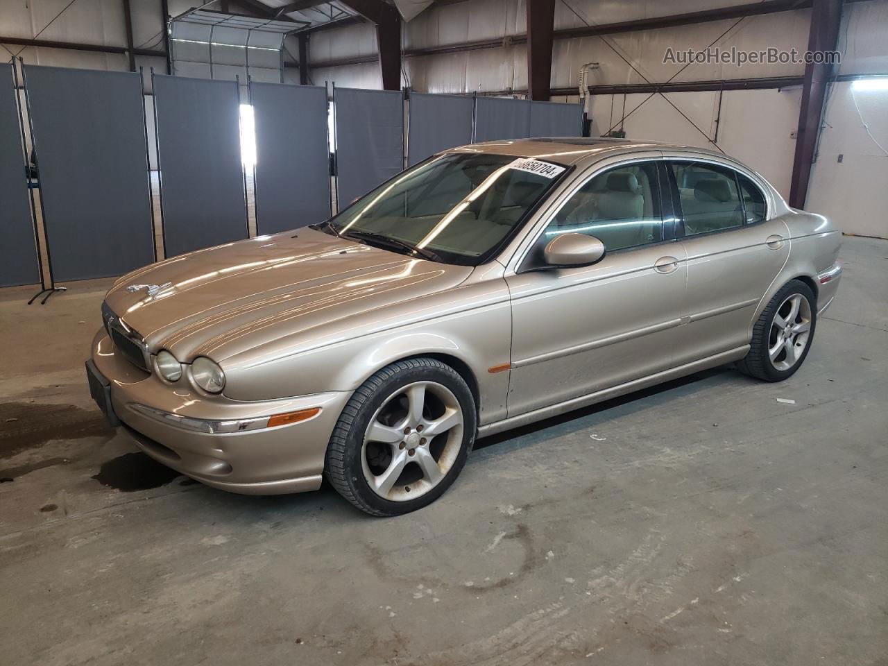 2003 Jaguar X-type 2.5 Gold vin: SAJEA51D93XD16532