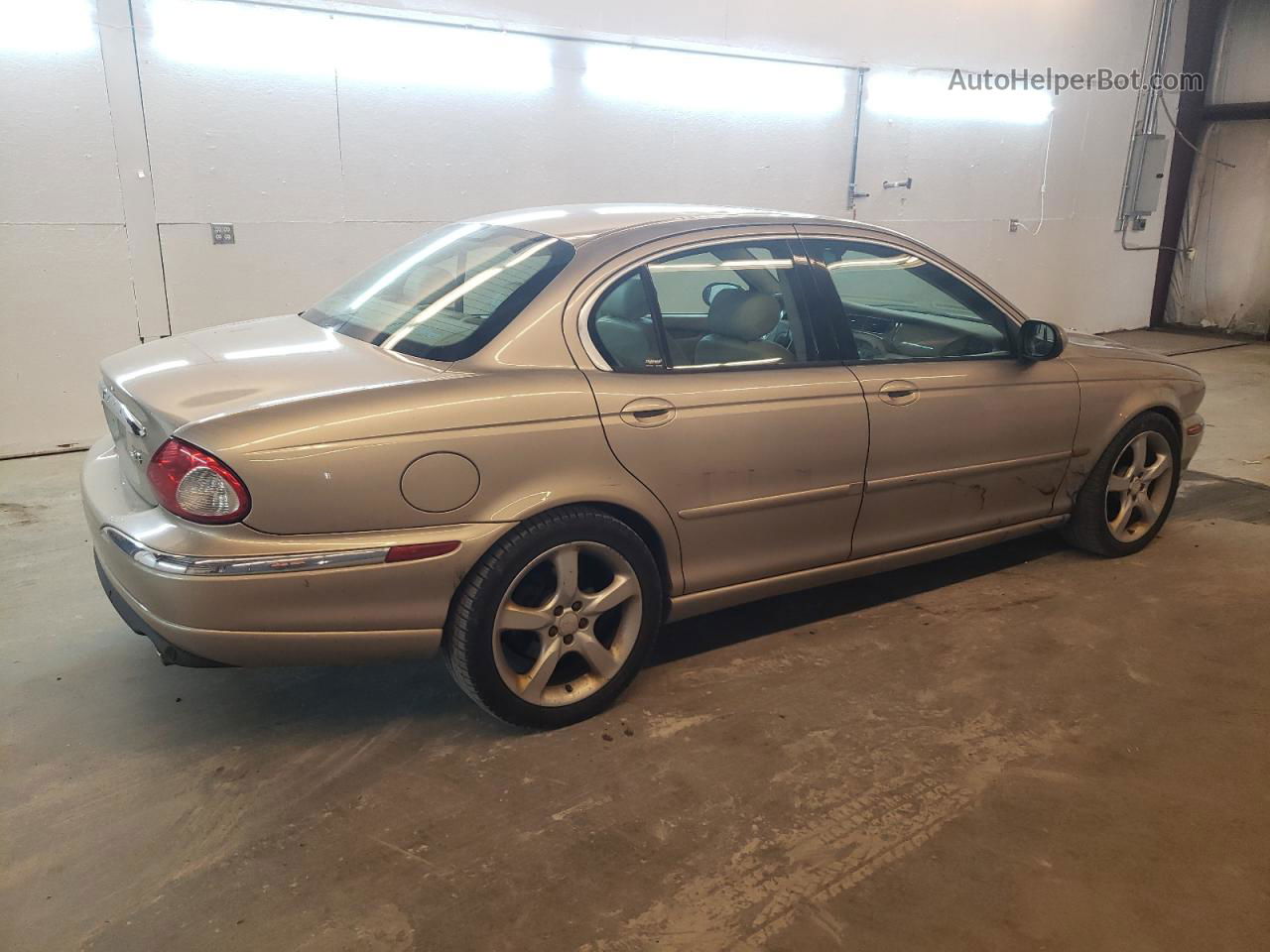 2003 Jaguar X-type 2.5 Gold vin: SAJEA51D93XD16532