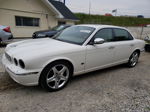 2006 Jaguar Vandenplas  White vin: SAJWA82B46SH09083