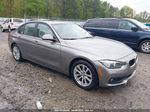 2016 Bmw 320i   Champagne vin: WBA8E1G58GNU12057