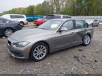 2016 Bmw 320i   Champagne vin: WBA8E1G58GNU12057