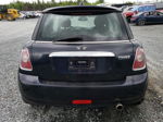 2007 Mini Cooper  Black vin: WMWMF33527TU61750