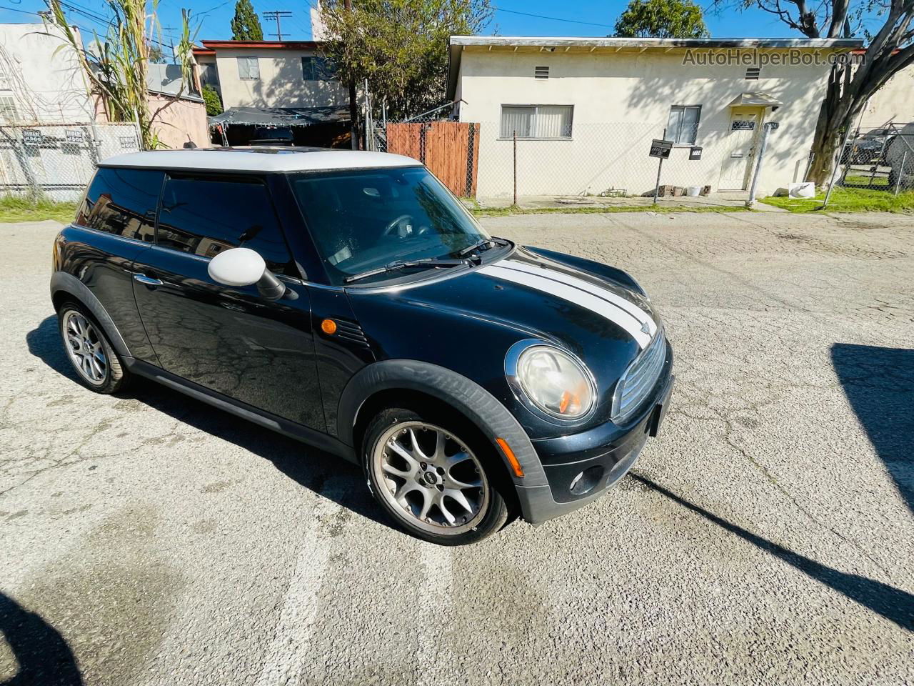 2007 Mini Cooper  Black vin: WMWMF33547TT52464