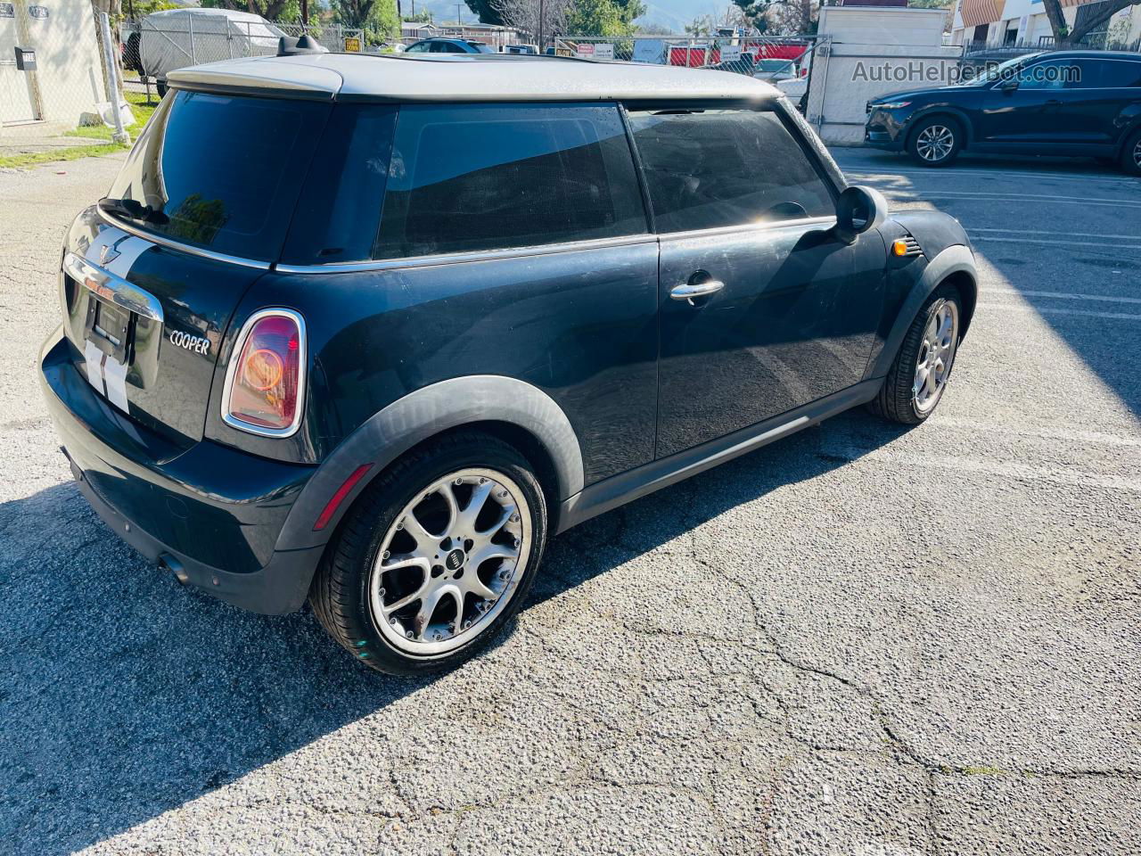 2007 Mini Cooper  Black vin: WMWMF33547TT52464