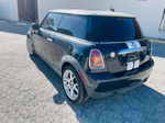 2007 Mini Cooper  Black vin: WMWMF33547TT52464