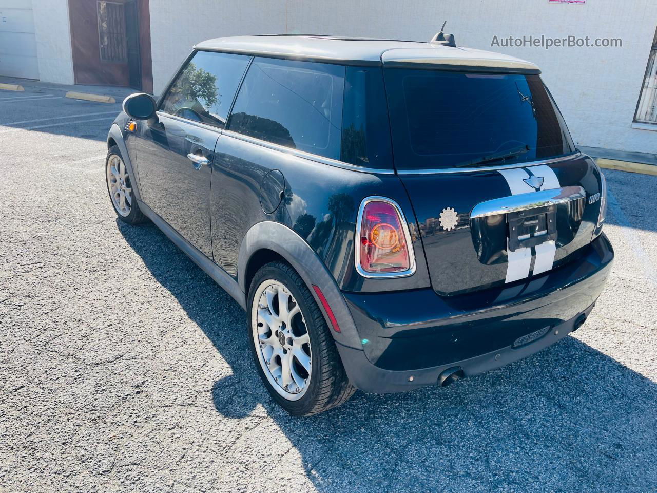 2007 Mini Cooper  Черный vin: WMWMF33547TT52464