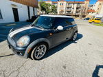 2007 Mini Cooper  Black vin: WMWMF33547TT52464