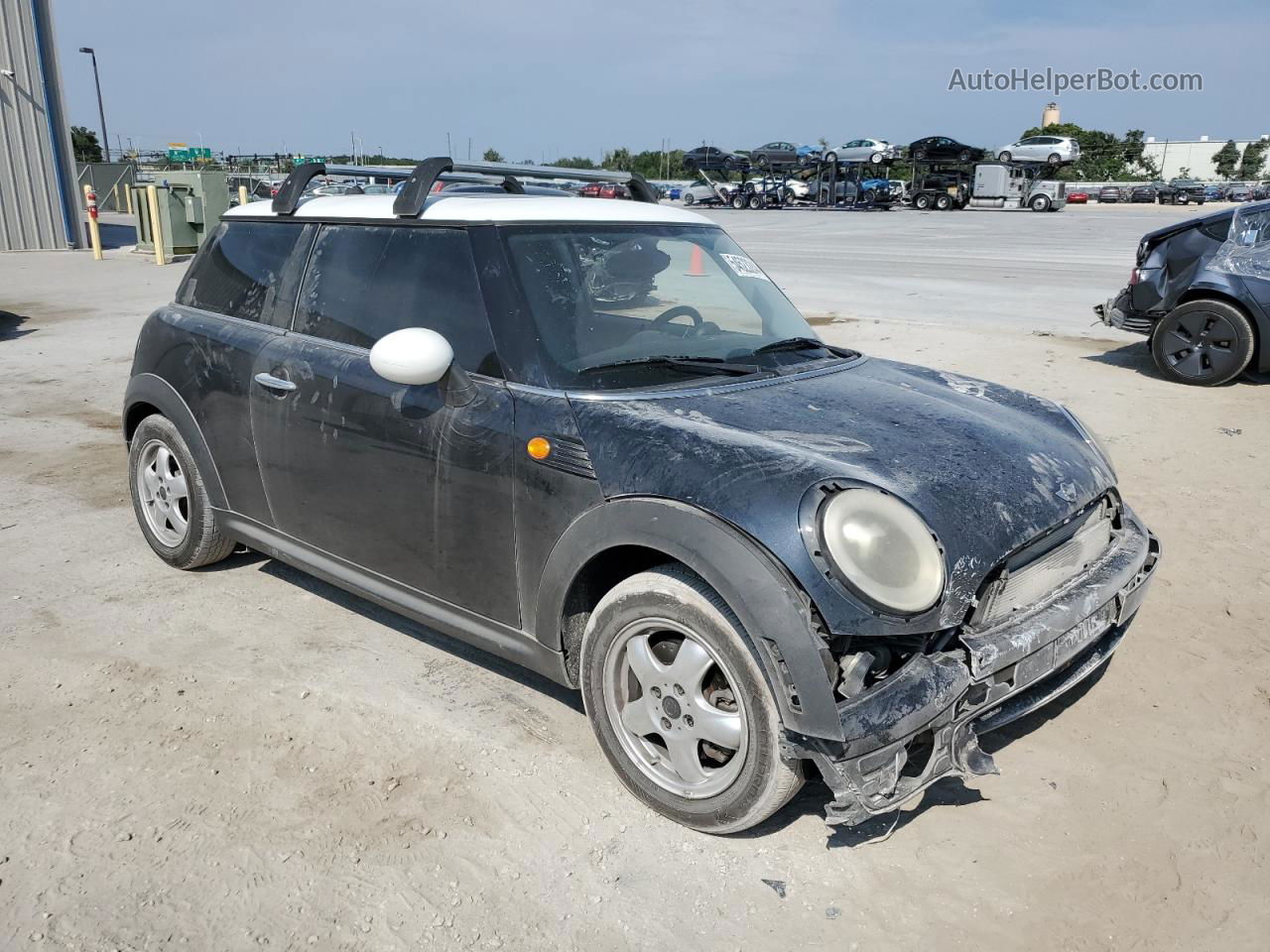 2007 Mini Cooper  Черный vin: WMWMF33587TT50331