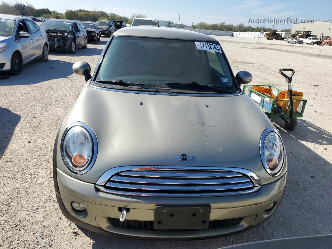 2007 Mini Cooper  Gold vin: WMWMF33587TT57733