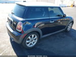 2007 Mini Cooper   Черный vin: WMWMF335X7TT51092