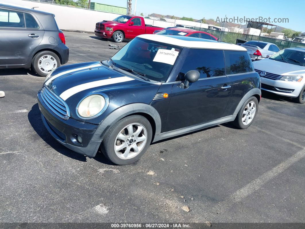 2007 Mini Cooper   Black vin: WMWMF335X7TT51092