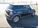 2007 Mini Cooper   Black vin: WMWMF335X7TT51092