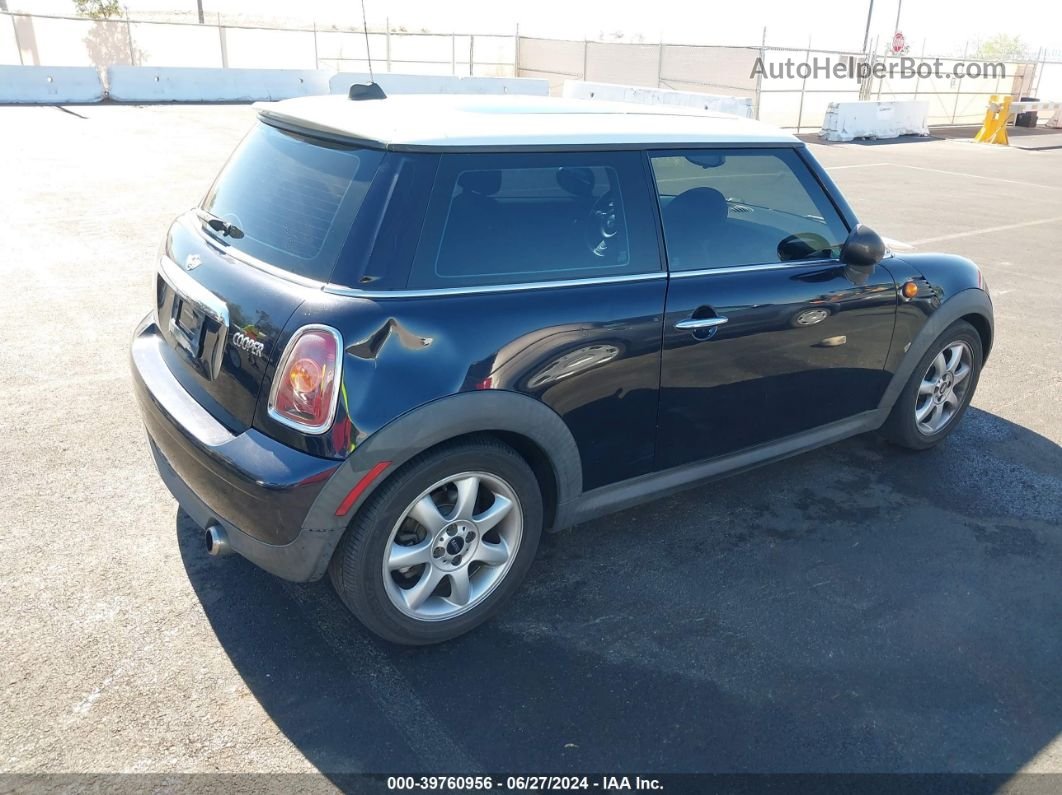 2007 Mini Cooper   Черный vin: WMWMF335X7TT51092