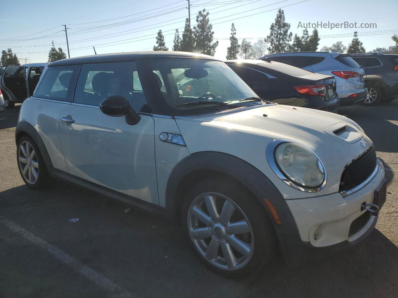 2007 Mini Cooper S Cream vin: WMWMF73507TL88059