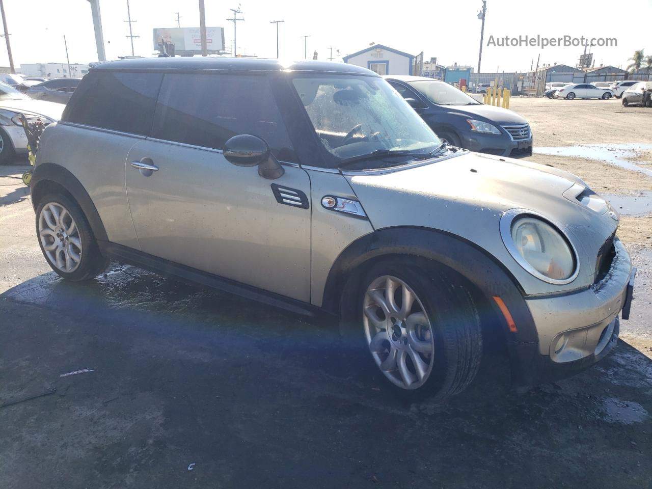 2007 Mini Cooper S Gold vin: WMWMF73527TT81906