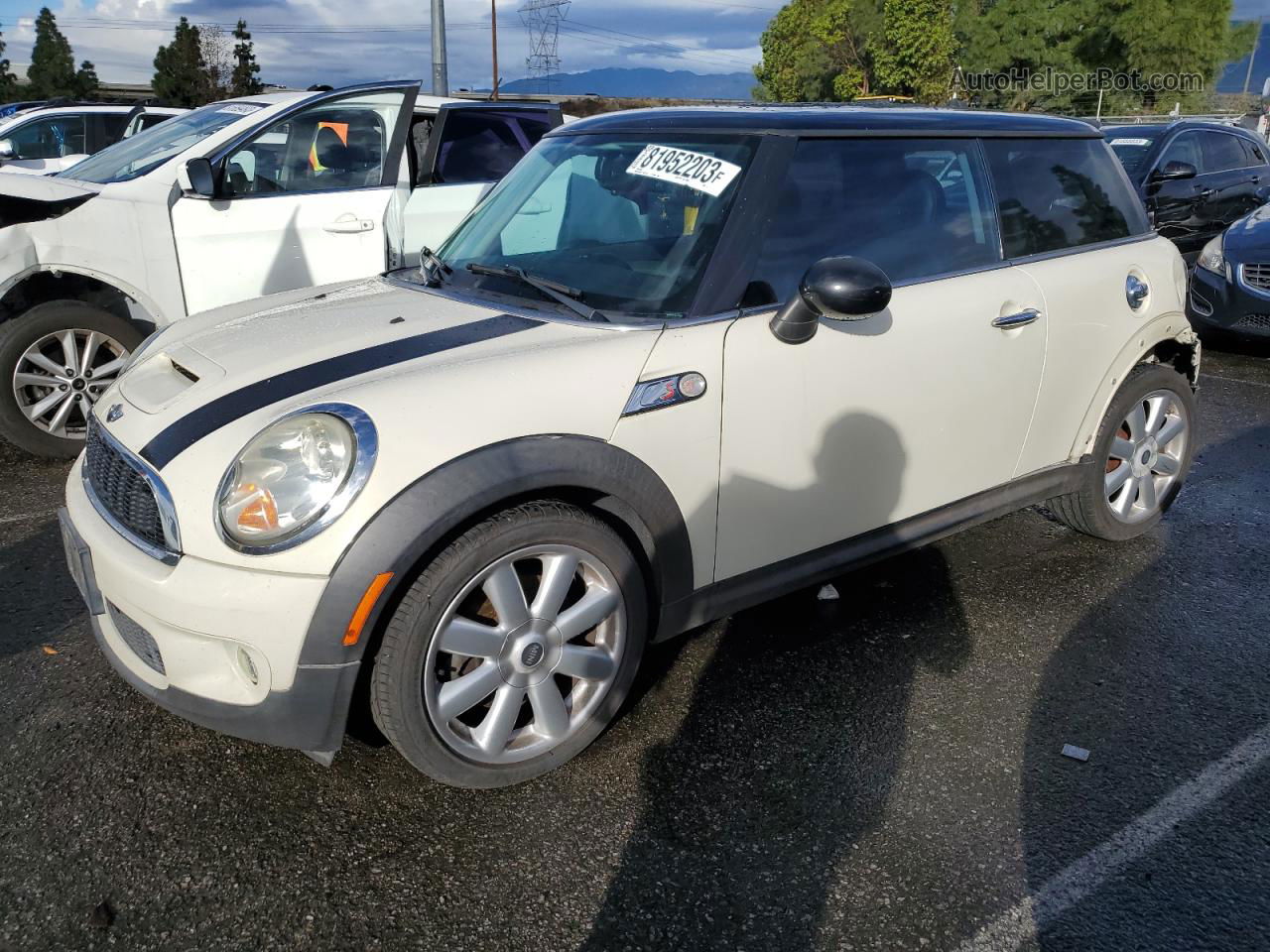 2007 Mini Cooper S Cream vin: WMWMF735X7TT80003