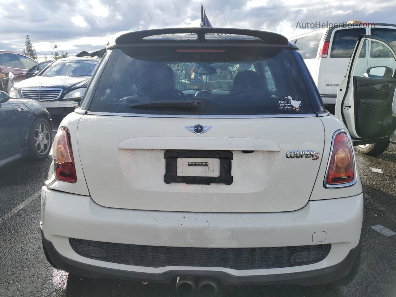 2007 Mini Cooper S Cream vin: WMWMF735X7TT80003