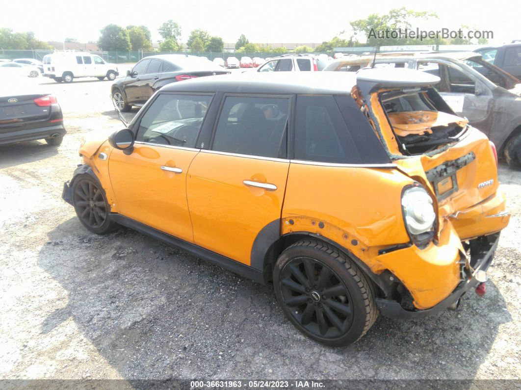 2015 Mini Cooper Hardtop 4 Door   Orange vin: WMWXS5C50FT827059