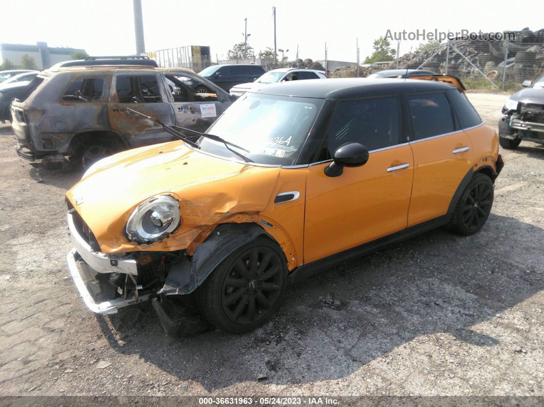 2015 Mini Cooper Hardtop 4 Door   Orange vin: WMWXS5C50FT827059