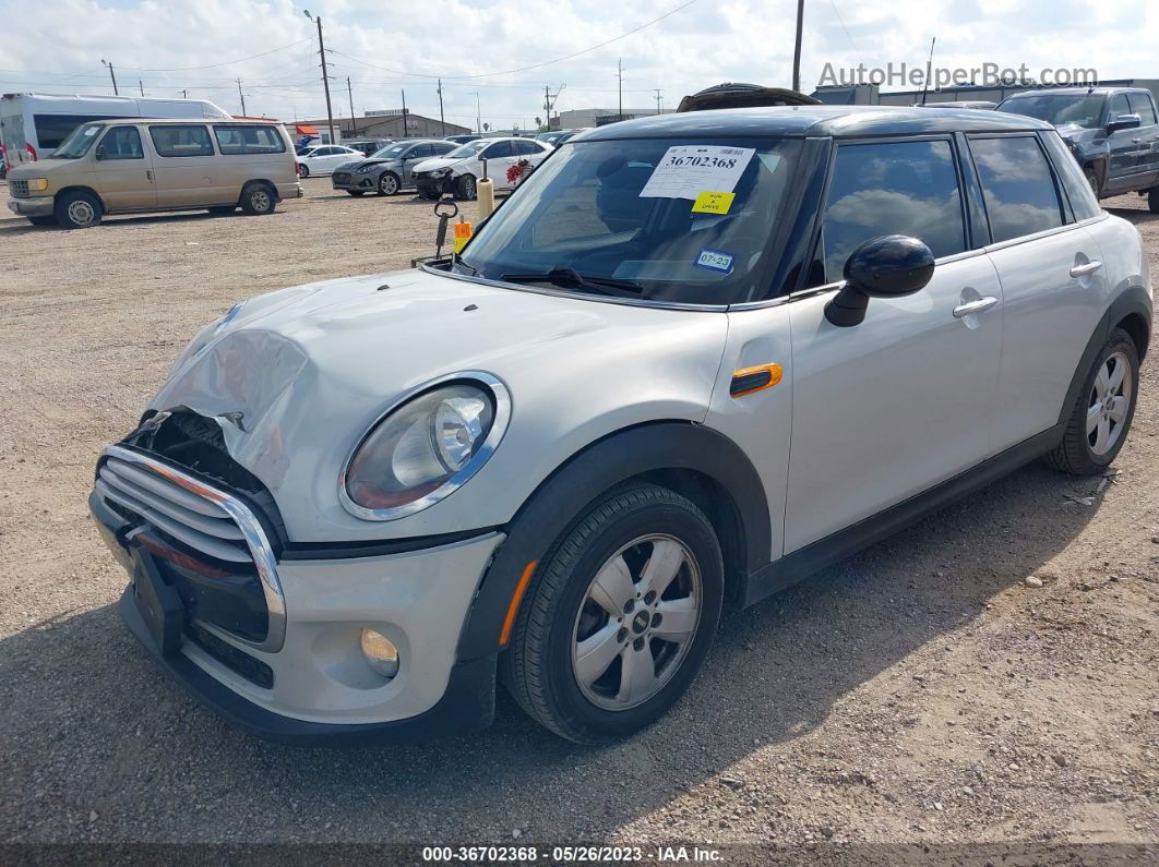 2015 Mini Cooper Hardtop 4 Door   White vin: WMWXS5C51FT837468