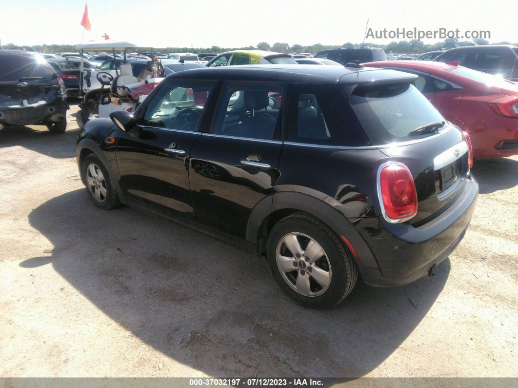 2015 Mini Cooper Hardtop 4 Door   Black vin: WMWXS5C52FT833624