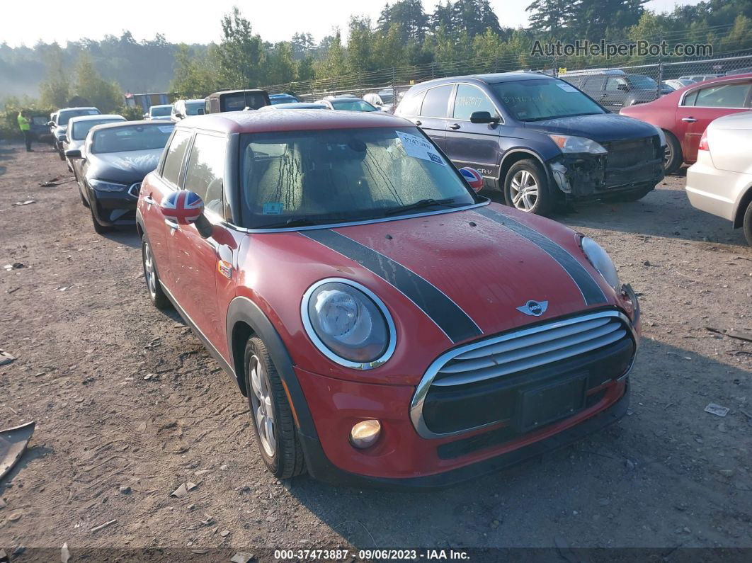 2015 Mini Cooper Hardtop 4 Door   Red vin: WMWXS5C52FT837883