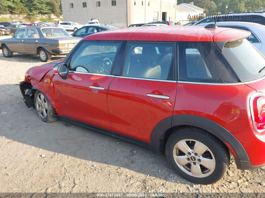 2015 Mini Cooper Hardtop 4 Door   Red vin: WMWXS5C52FT837883