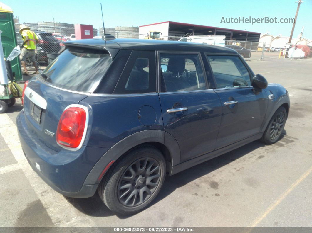 2015 Mini Cooper Hardtop 4 Door   Blue vin: WMWXS5C53FT828044