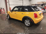 2015 Mini Cooper Hardtop 4 Door   Yellow vin: WMWXS5C55FT832841