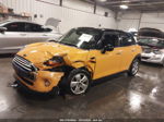 2015 Mini Cooper Hardtop 4 Door   Yellow vin: WMWXS5C55FT832841