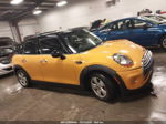 2015 Mini Cooper Hardtop 4 Door   Yellow vin: WMWXS5C55FT832841