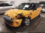 2015 Mini Cooper Hardtop 4 Door   Yellow vin: WMWXS5C55FT832841