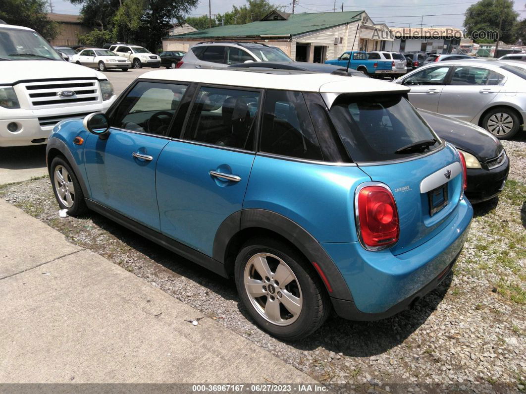 2015 Mini Cooper Hardtop 4 Door   Blue vin: WMWXS5C55FT833990