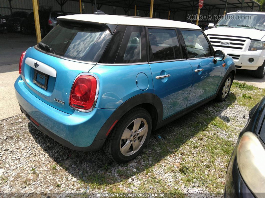 2015 Mini Cooper Hardtop 4 Door   Blue vin: WMWXS5C55FT833990