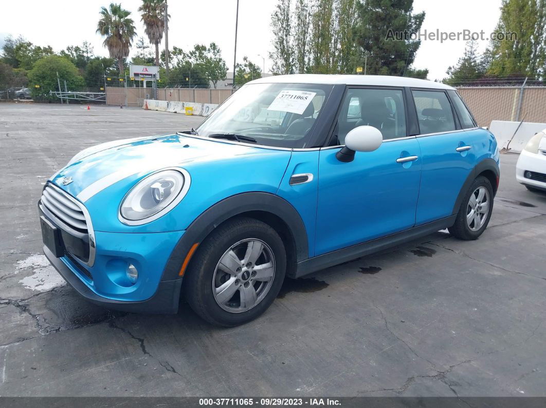 2015 Mini Cooper Hardtop 4 Door   Blue vin: WMWXS5C57FT830458