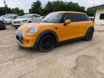 2015 Mini Cooper  Orange vin: WMWXS5C58FT828458