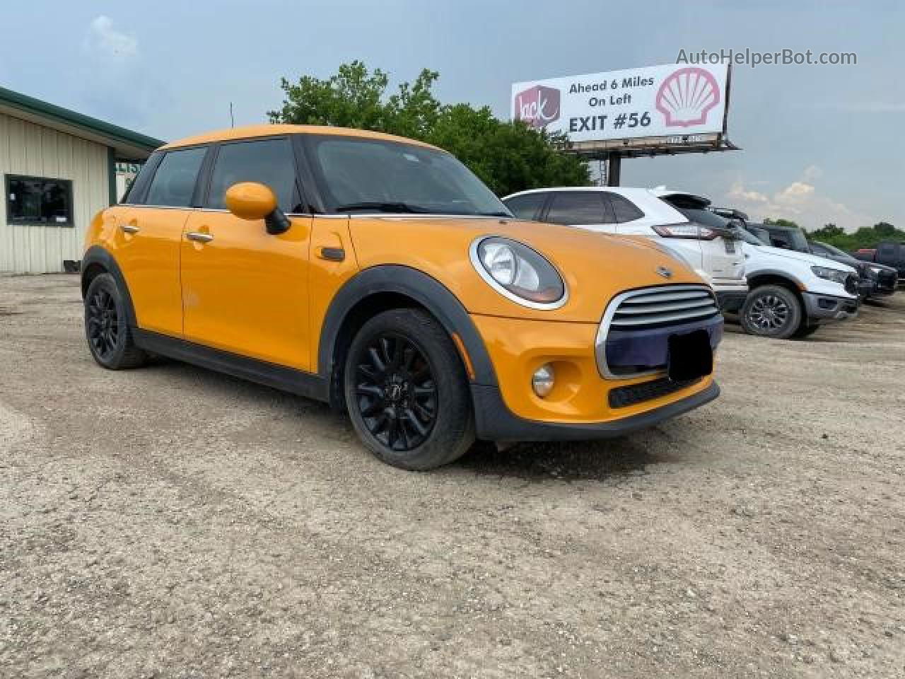 2015 Mini Cooper  Orange vin: WMWXS5C58FT828458