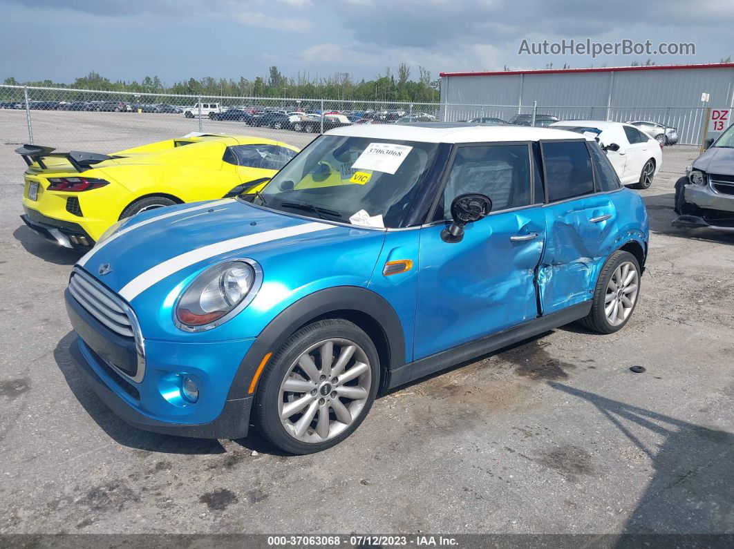 2015 Mini Cooper Hardtop 4 Door   Blue vin: WMWXS5C5XFT827280