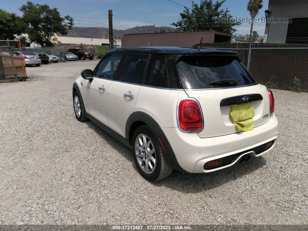 2015 Mini Cooper Hardtop 4 Door S Beige vin: WMWXU3C57FT891811