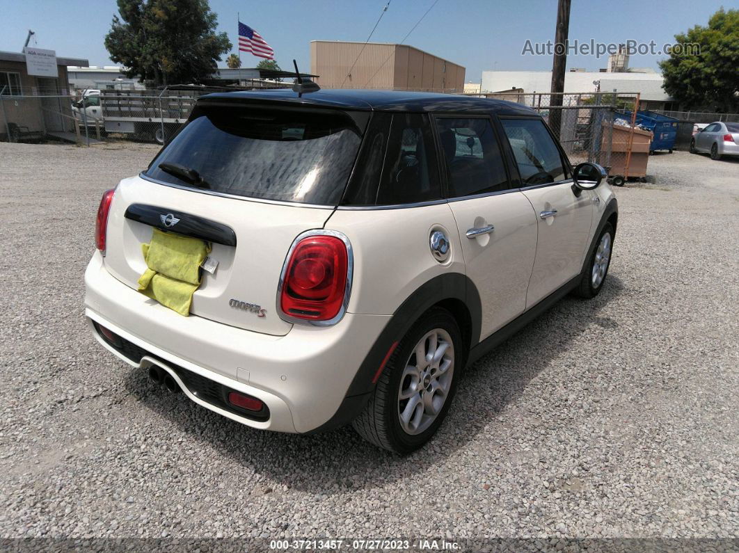 2015 Mini Cooper Hardtop 4 Door S Beige vin: WMWXU3C57FT891811