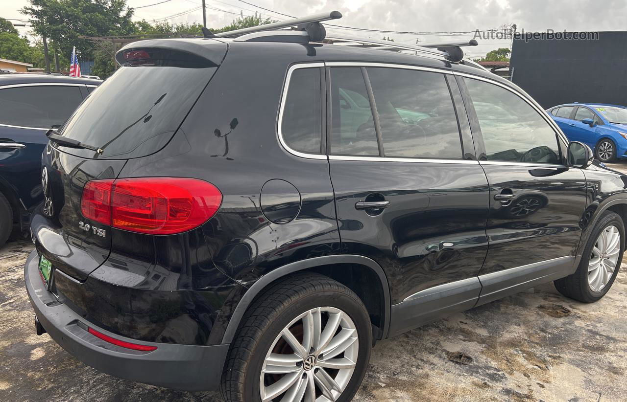 2013 Volkswagen Tiguan S Black vin: WVGAV3AX4DW601476